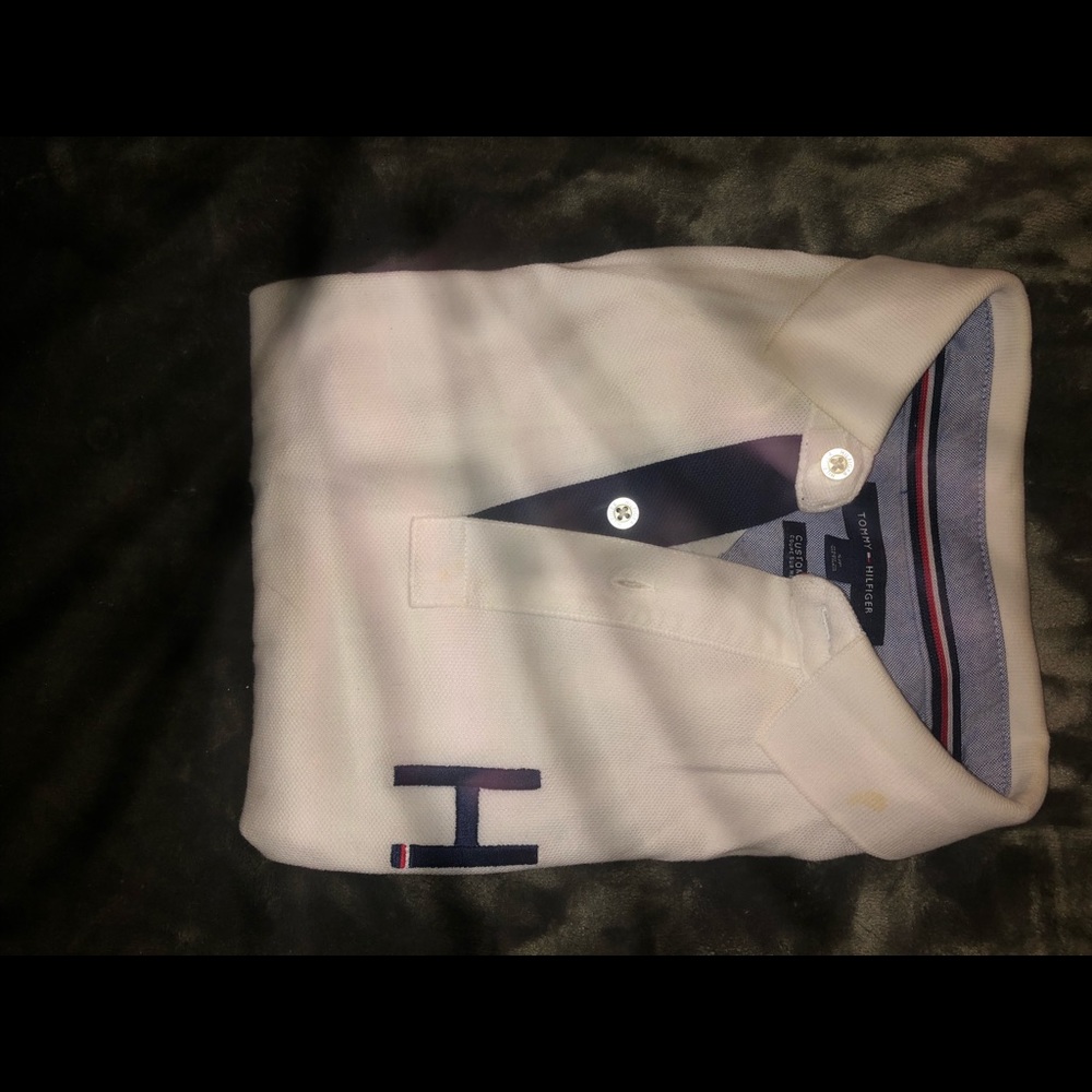 White Tommy Hilfiger polo shirt. Men’s size small.